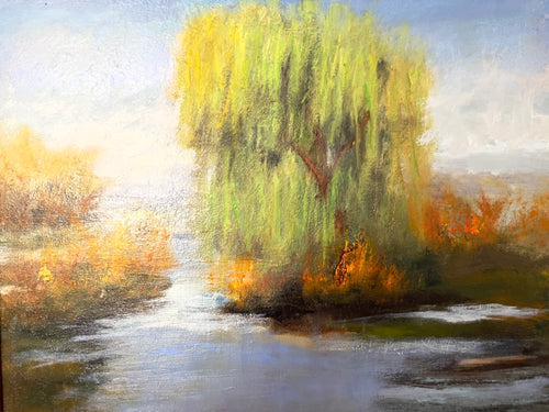 Impressionist painting of a willow tree with golden light reflected on still water