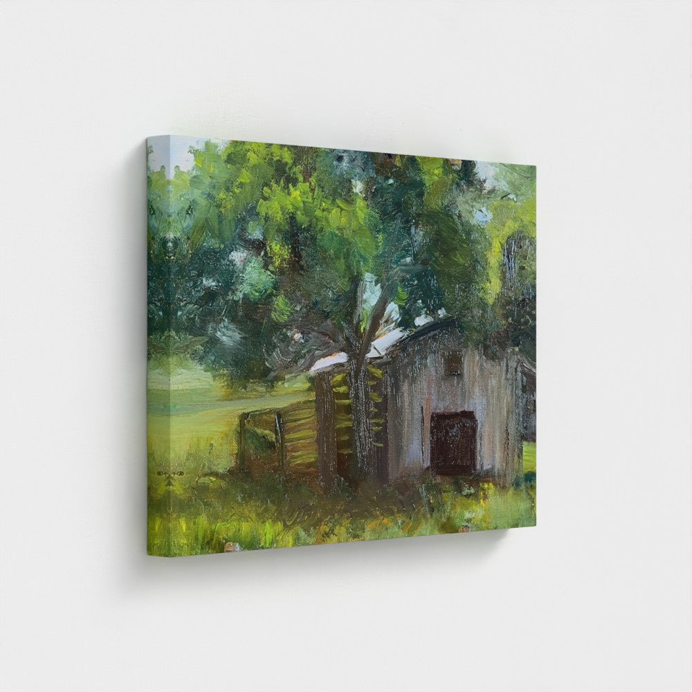 Impressionist painting of a weathered barn with green trees and warm golden light