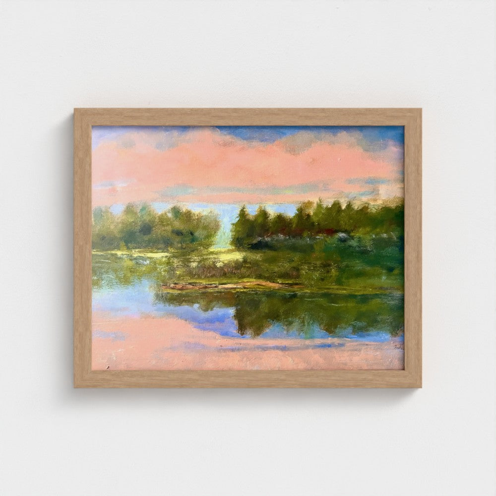 Impressionist framed painting of a calm lake with distant trees and soft pink light reflecting on still water