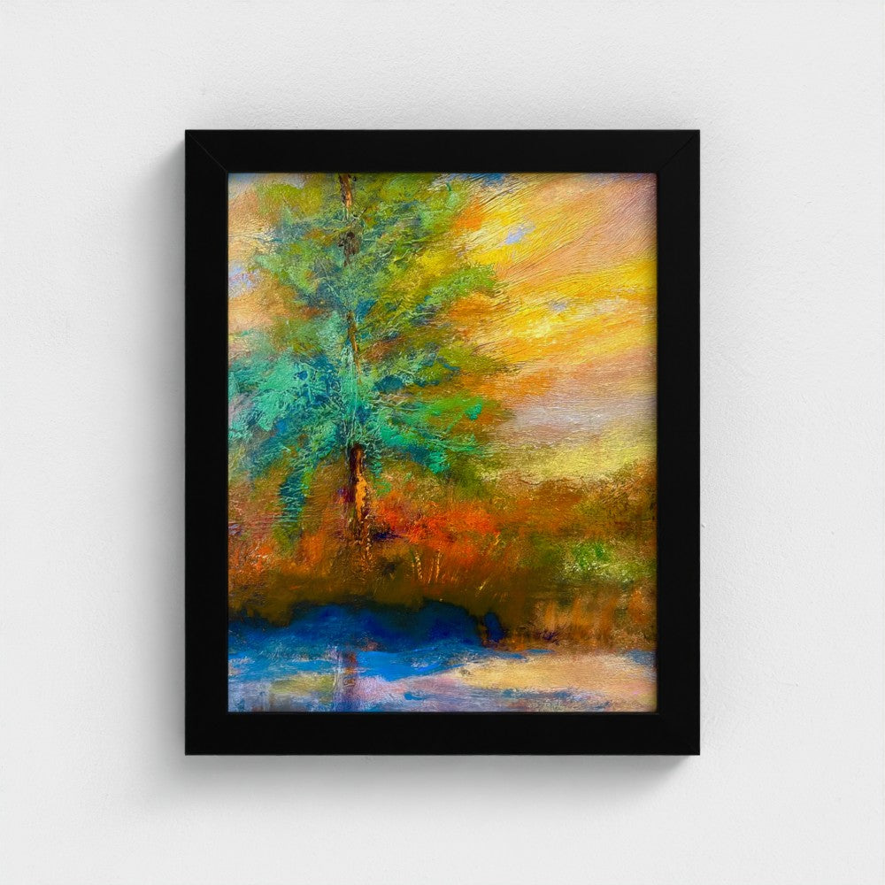 Framed impressionist painting of a radiant sunrise over the horizon with vivid yellow and red sky