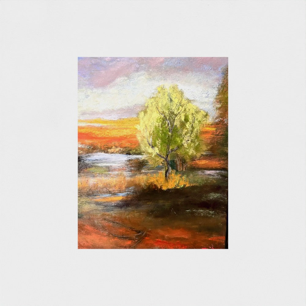 Impressionist painting of a bright green spring tree with golden sunset light over land and water